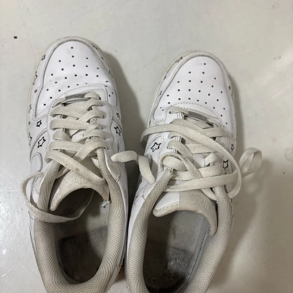 Nike White Sneakers with Black Star Accents - Picture 2 of 5